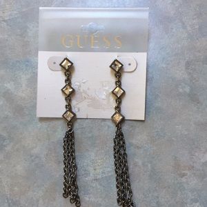 Guess earrings. Silver tone drop earrings